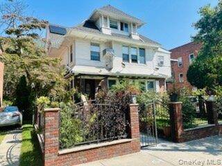Spacious first floor apartment with a private entrance, featuring 4 sizable bedrooms Living room, dining room, and sunroom 5 wall to wall closets 2 full bathrooms Modern Italian kitchen with ...