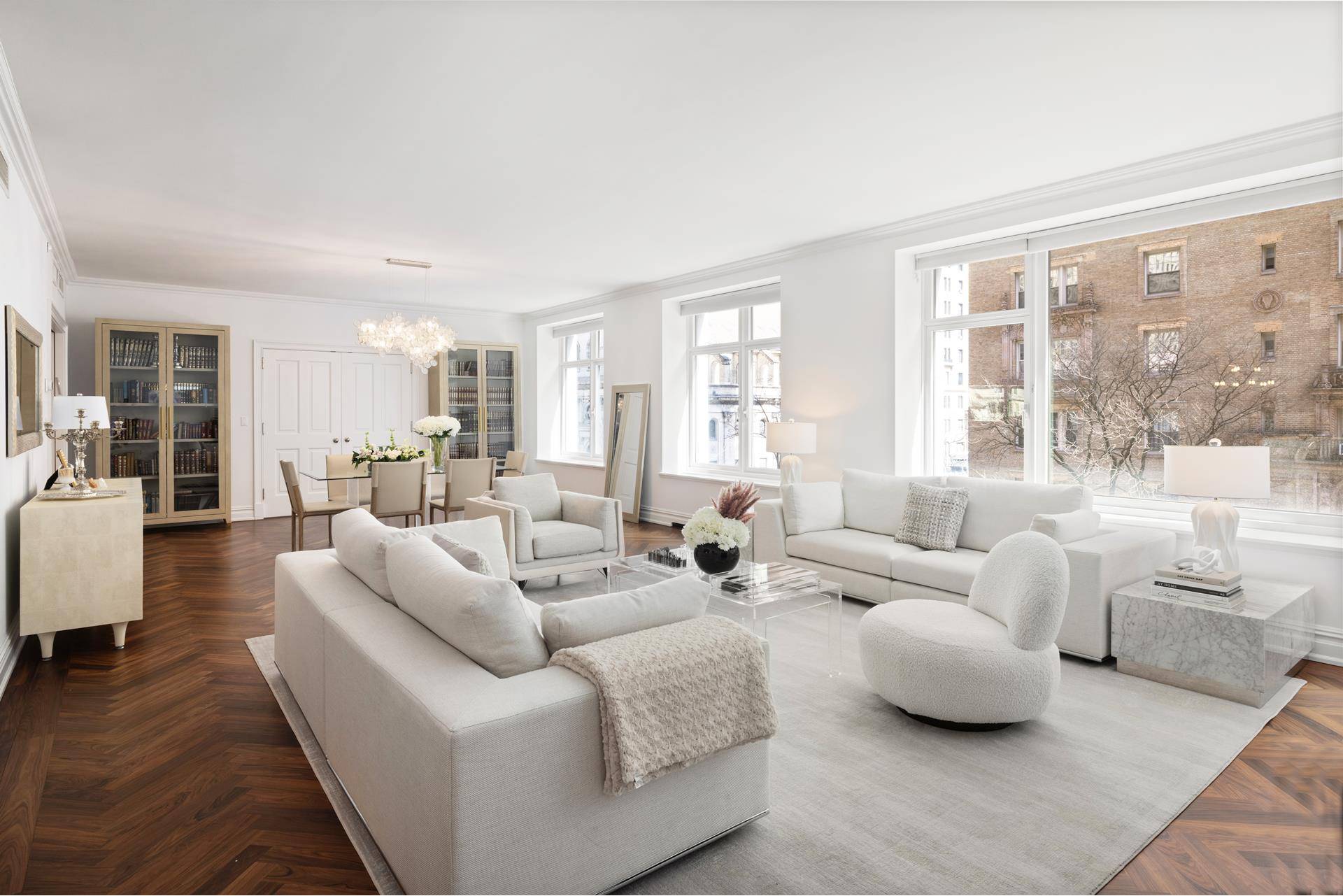 NEW PRICE ! This stunning half floor residence has the charm and sensibility of a prewar cooperative, with all of the modern conveniences of new construction.