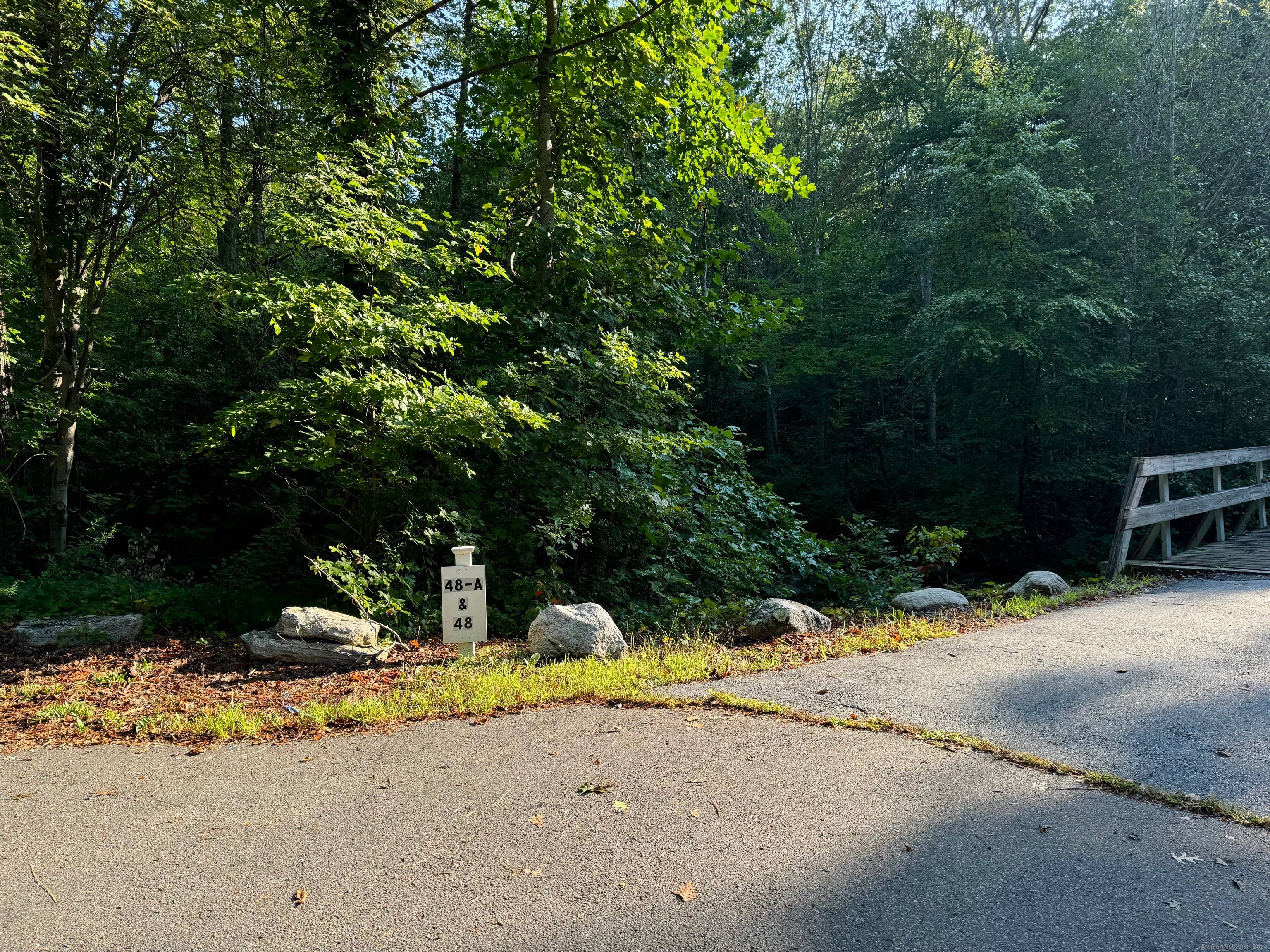 Welcome to The River Wood a 3 bedroom custom home, nestled on a sprawling 4.