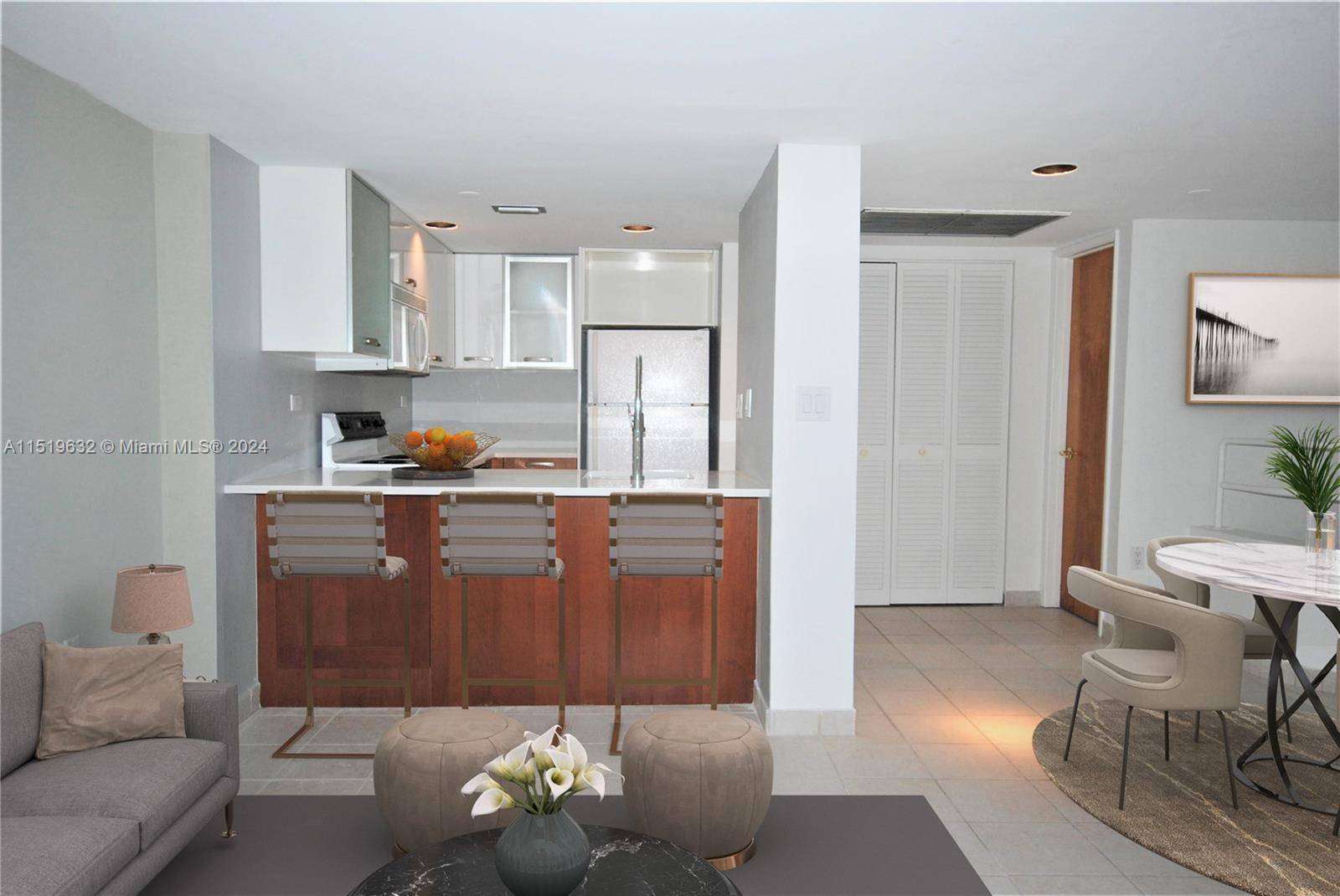 Live in the heart of Coconut Grove in one of the most charming condominiums with a serene tropical courtyard and deck.