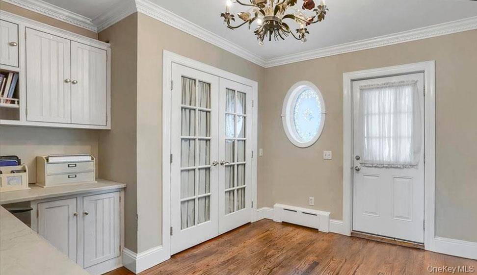 Welcome to this extraordinary residence, masterfully designed 4 bedroom center staircase Colonial.