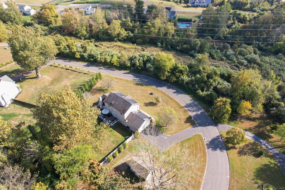 Stunning Four Bedroom Colonial on a Private Lot.