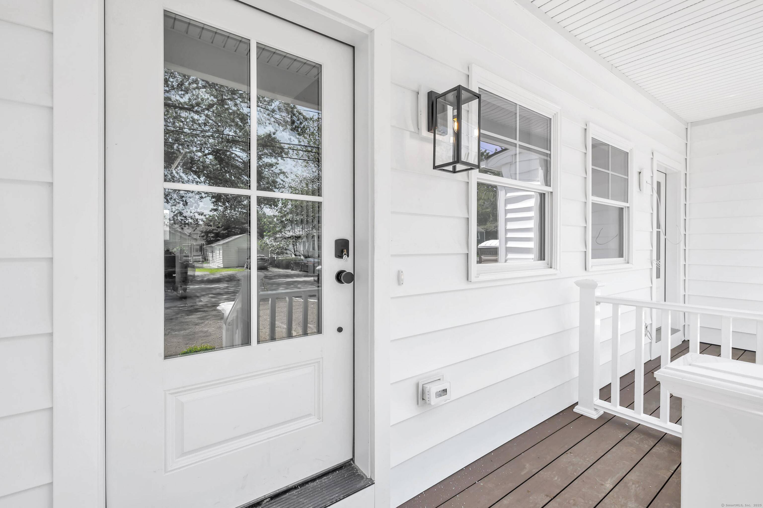 Welcome to this stunning, newly constructed duplex style residence where contemporary design and thoughtful details create a truly elevated living experience.