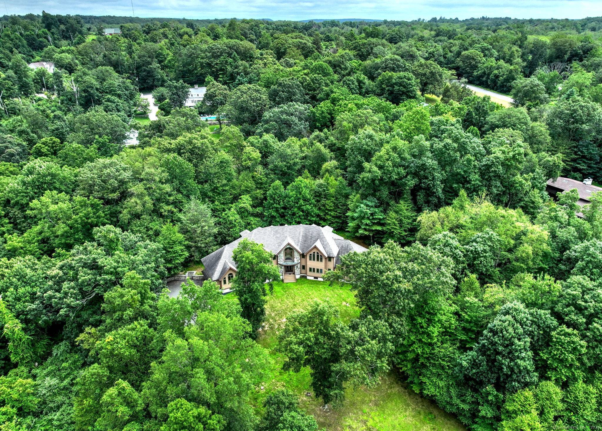 Perfect for a large or multi generational family, this expansive custom built home offers exceptional space, quality craftsmanship, and flexible living options.