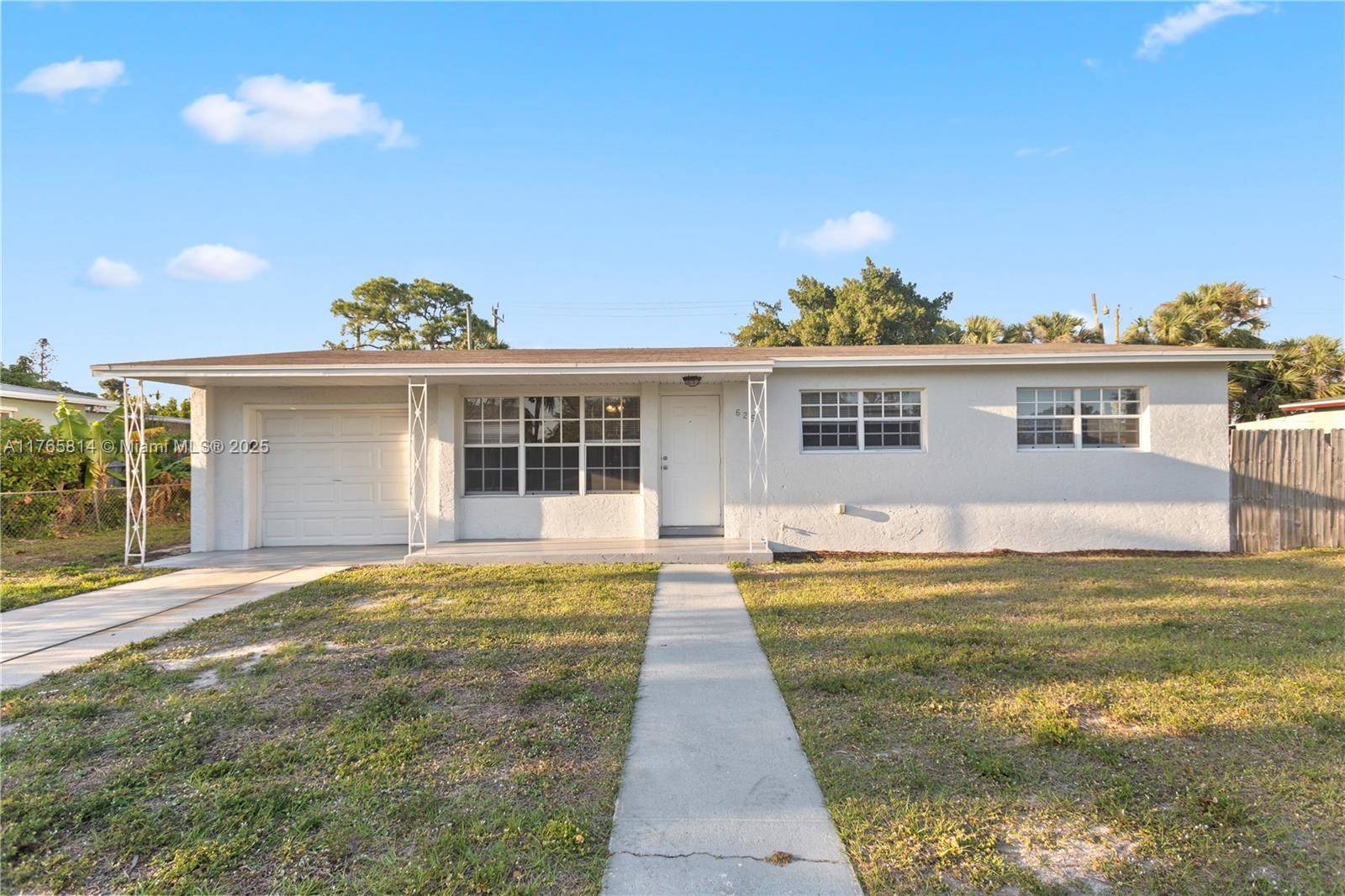 Nestled in the serene community of Lake Park, this single family home offers a perfect blend of comfort and functionality.