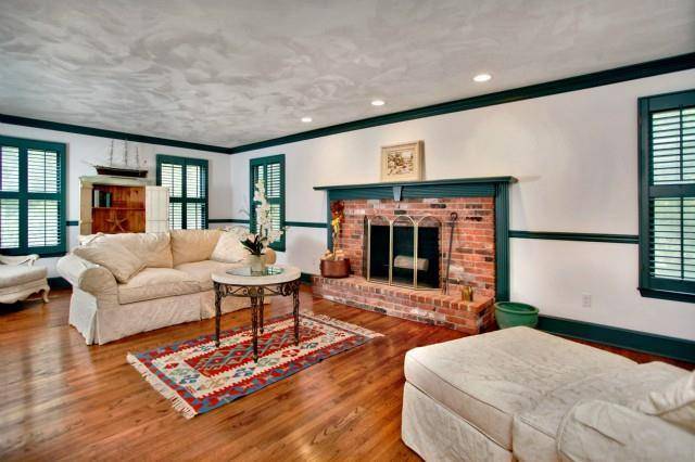 Spacious, furnished 5 Bedroom 3 full 2 half bath colonial located on a tranquil lot on a highly desirable Long Lots cul de sac.