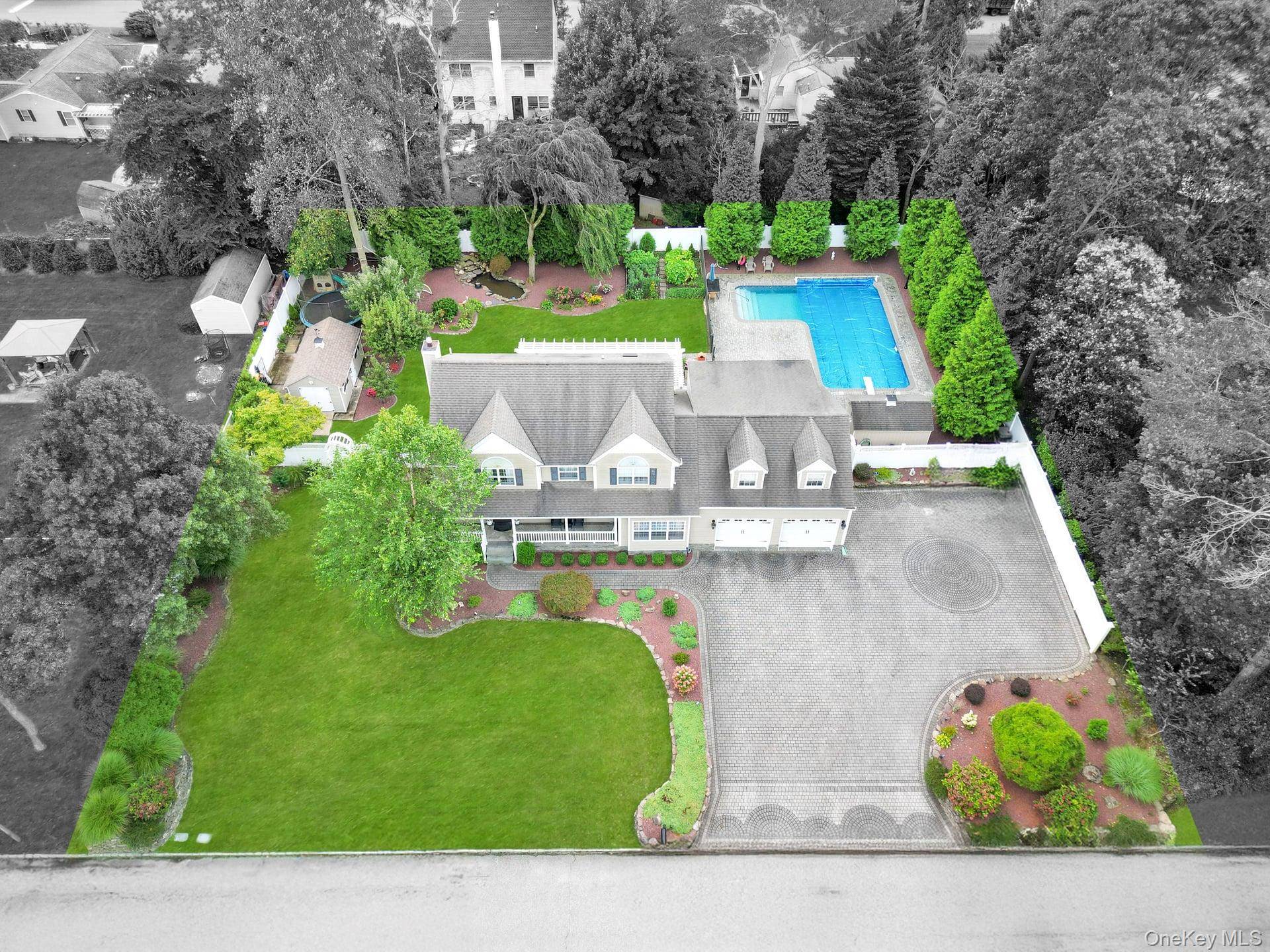 Incredible opportunity to own a beautifully built colonial tucked midblock in a quiet cul de sac on just under a half acre, where curb appeal meets resort style living.