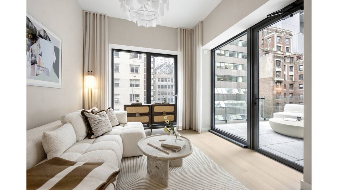 Residence 807 is a 793 square foot one bedroom home with southern exposures, enhanced by a 73 square foot private terrace.