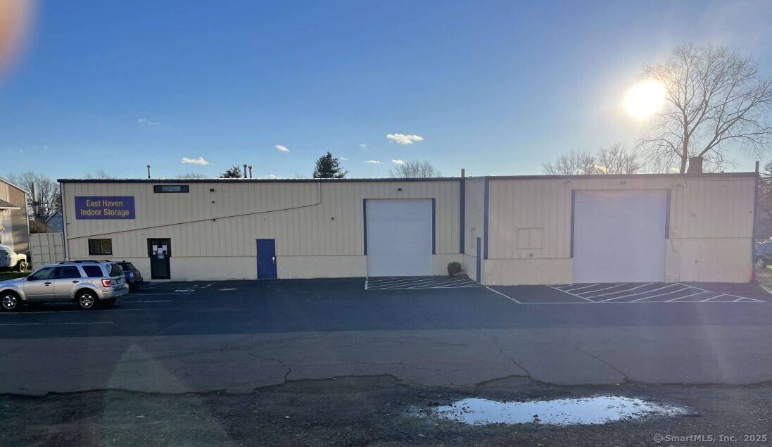 2. 665 Old Bradley Street in East Haven, Connecticut, is a commercial warehouse, currently serves as a Self Storage Facility, but can be converted.