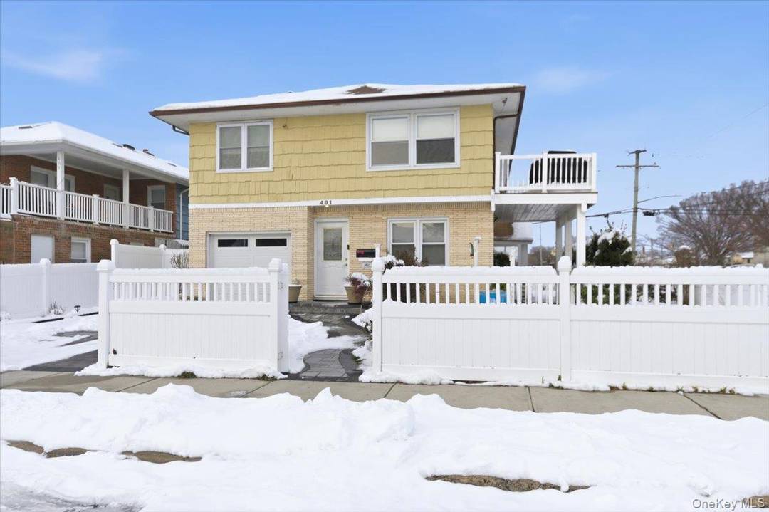 Light and Bright second floor apartment, Primary bedroom with private full bath, 2 additional bedrooms, full bath, plus enclosed porch.