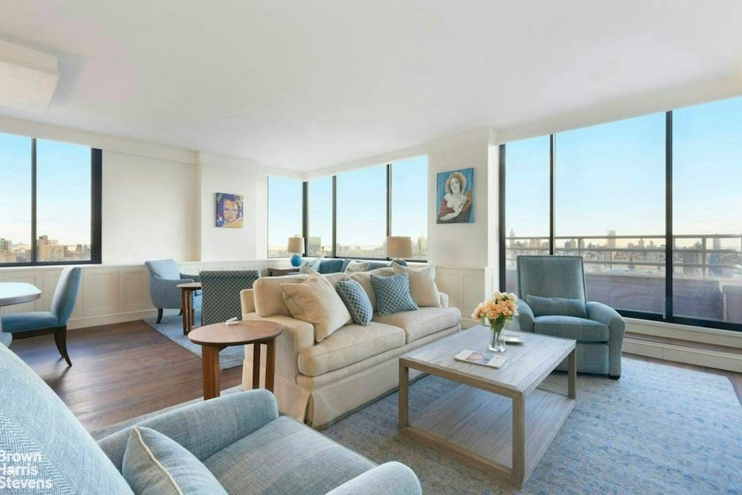 Perched high in the tower, this rare corner residence offers a remarkable opportunity to own a gracious 2 3 bedroom home with sweeping, unobstructed panoramic views of Central Park, the ...