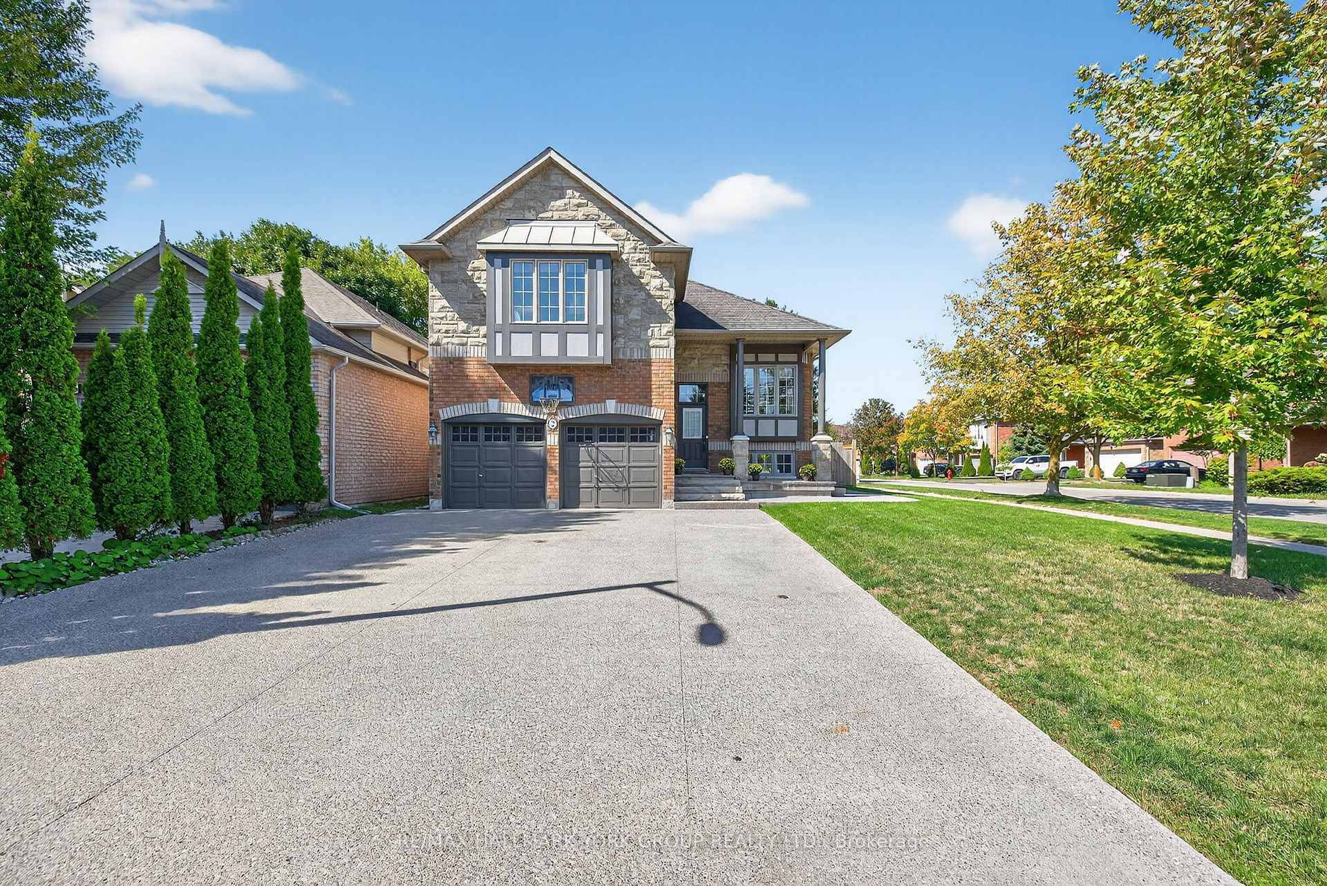 Unique, not to be missed raised bungalow with 2 primary bedrooms with ensuite baths, perfect for extended family living.