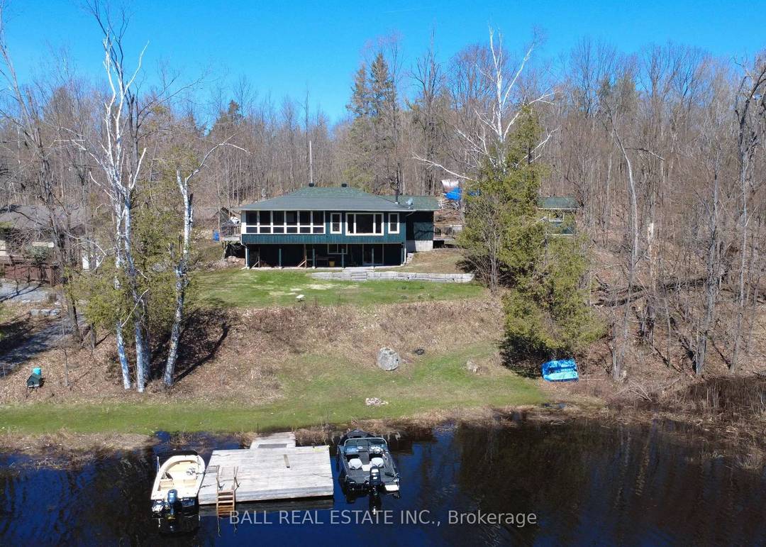 Stoney Lake ! ! Year round bungalow, detached heated garage and large drive shed set on half an acre of land with 130ft of private waterfront on Stoney Lake !