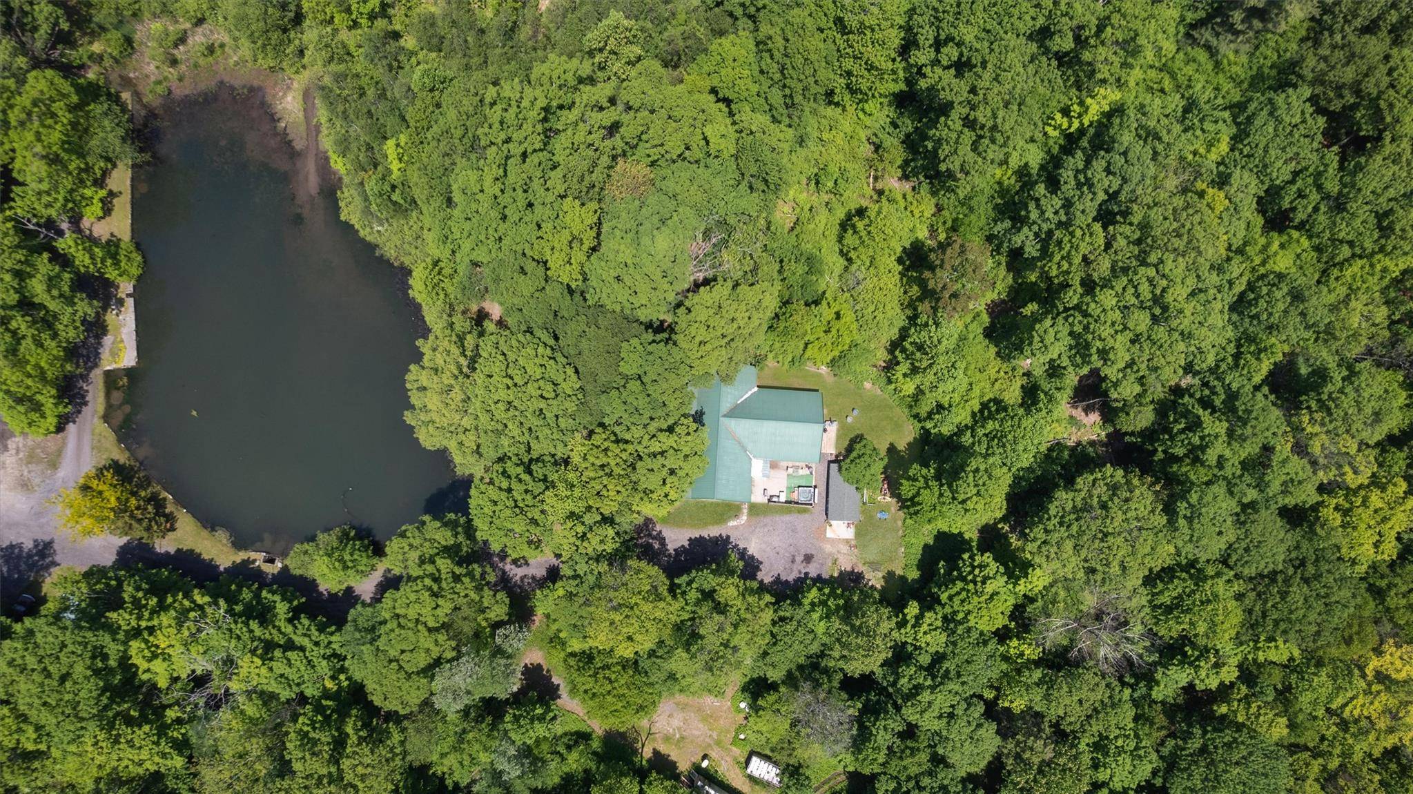 Nestled on 13 PICTURESQUE ACRES, this stunning custom built home at 436 Roosa Gap Road offers 3, 975 square feet of exceptional craftsmanship and thoughtful design.