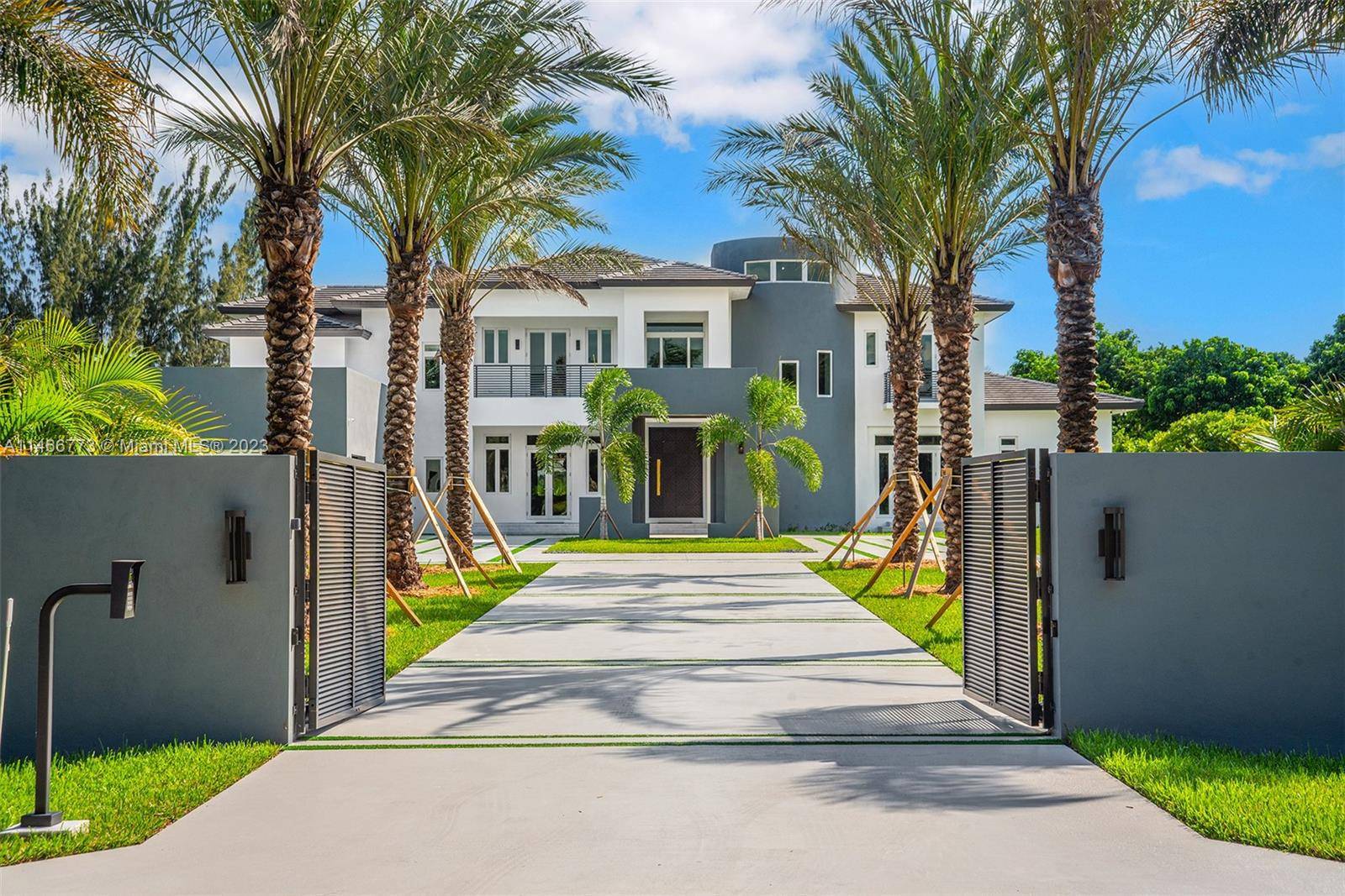 Welcome to the Alexander Estate, this gated turnkey custom built masterpiece positioned on 2.