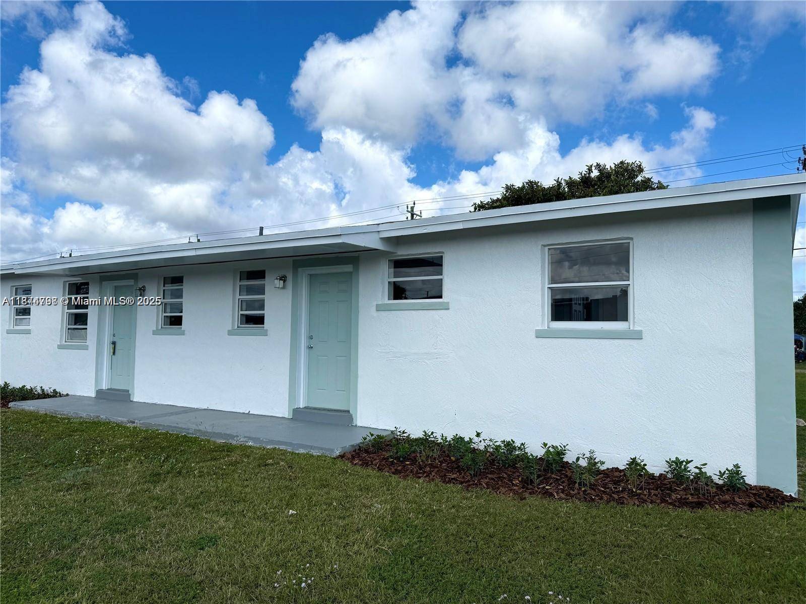 This renovated duplex in Miami offers 2 units, each featuring 3 bedrooms and 1 bathroom, with one unit currently occupied by a month to month tenant.