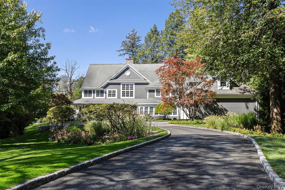 Nestled on 1. 5 acres of beautifully landscaped, level grounds in the prestigious Hillandale estate area of Rye Brook, this exceptional newer Colonial exemplifies timeless elegance and modern sophistication.