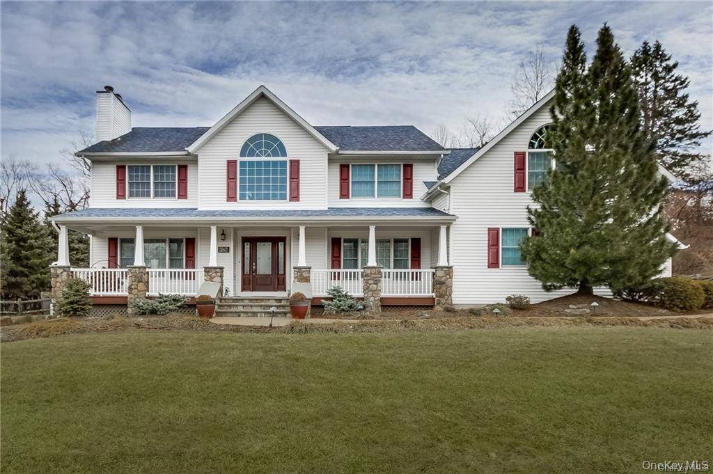 Absolutely stunning 5 bedroom Colonial set on over an acre of beautifully manicured, gated grounds.