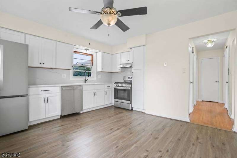 Welcome to this exceptional renovated multi family property located at 161 Delafield Ave, Lyndhurst, NJ just 1 block from the train, NYC bus, shopping centers and town park.