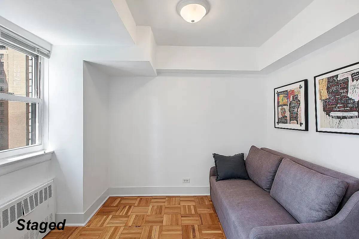 Sun drenched high floor convertible two bedroom fully furnished in the heart of Murray Hill.