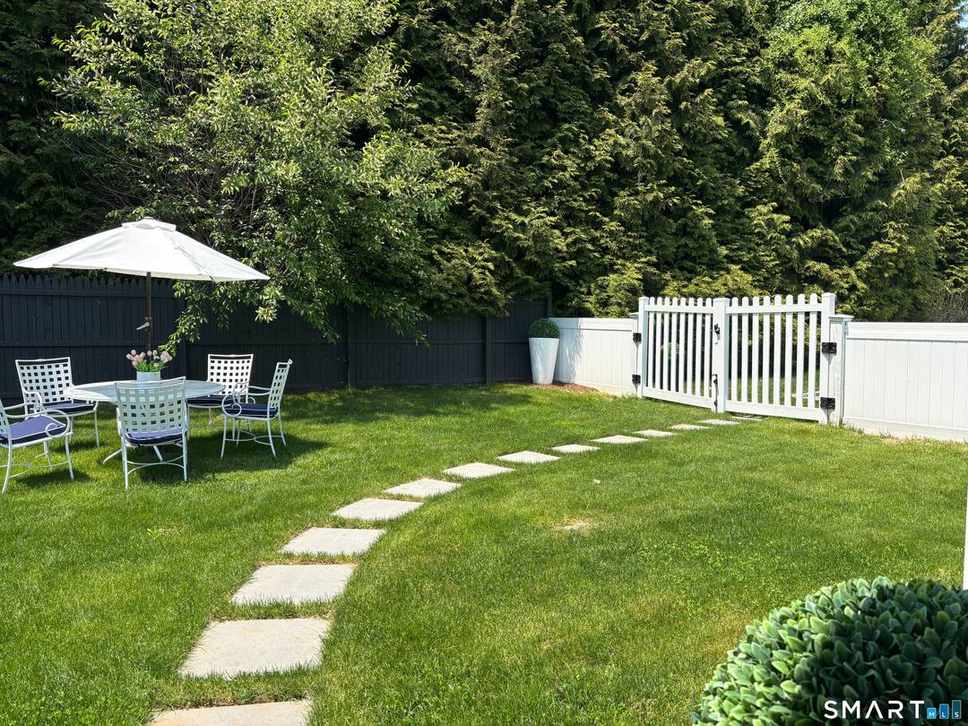 Tucked away in a private setting, this beautifully furnished newly constructed cottage offers effortless luxury and turnkey convenience.