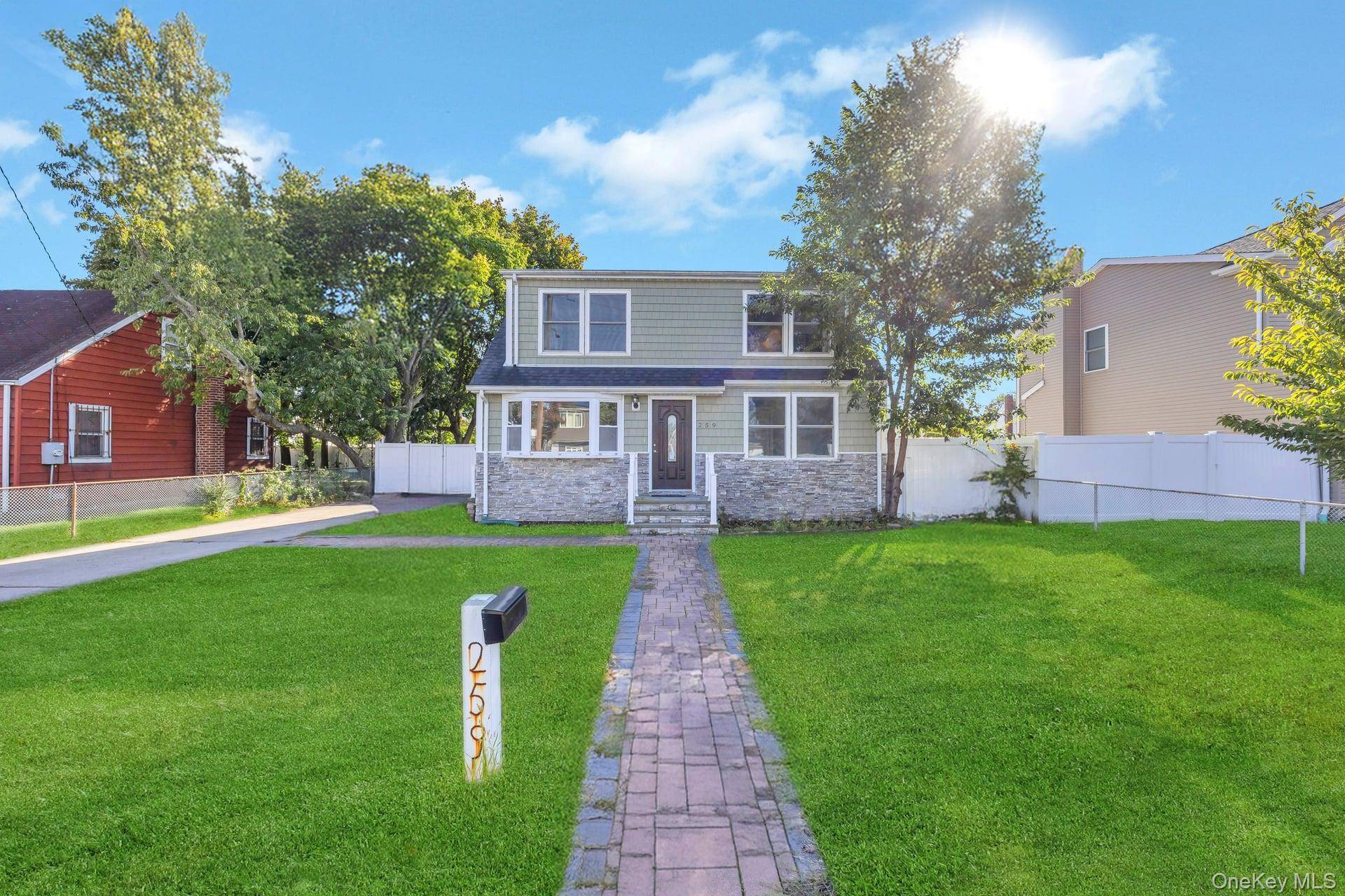 Welcome to this beautifully updated 4 bedroom, 2 bath Cape nestled in the heart of Lindenhurst Village.
