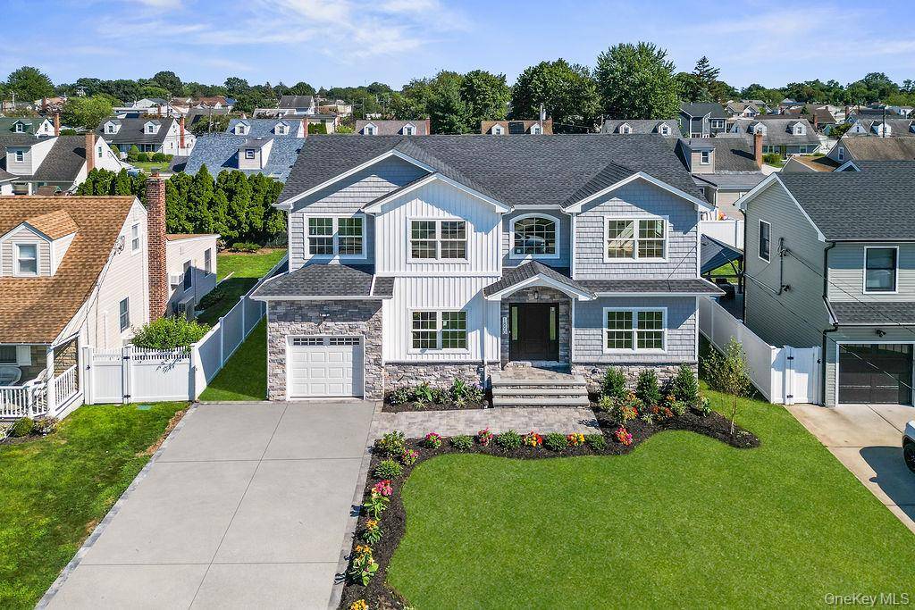 Brand New Modern colonial in beautiful and quiet East Meadow neighborhood.