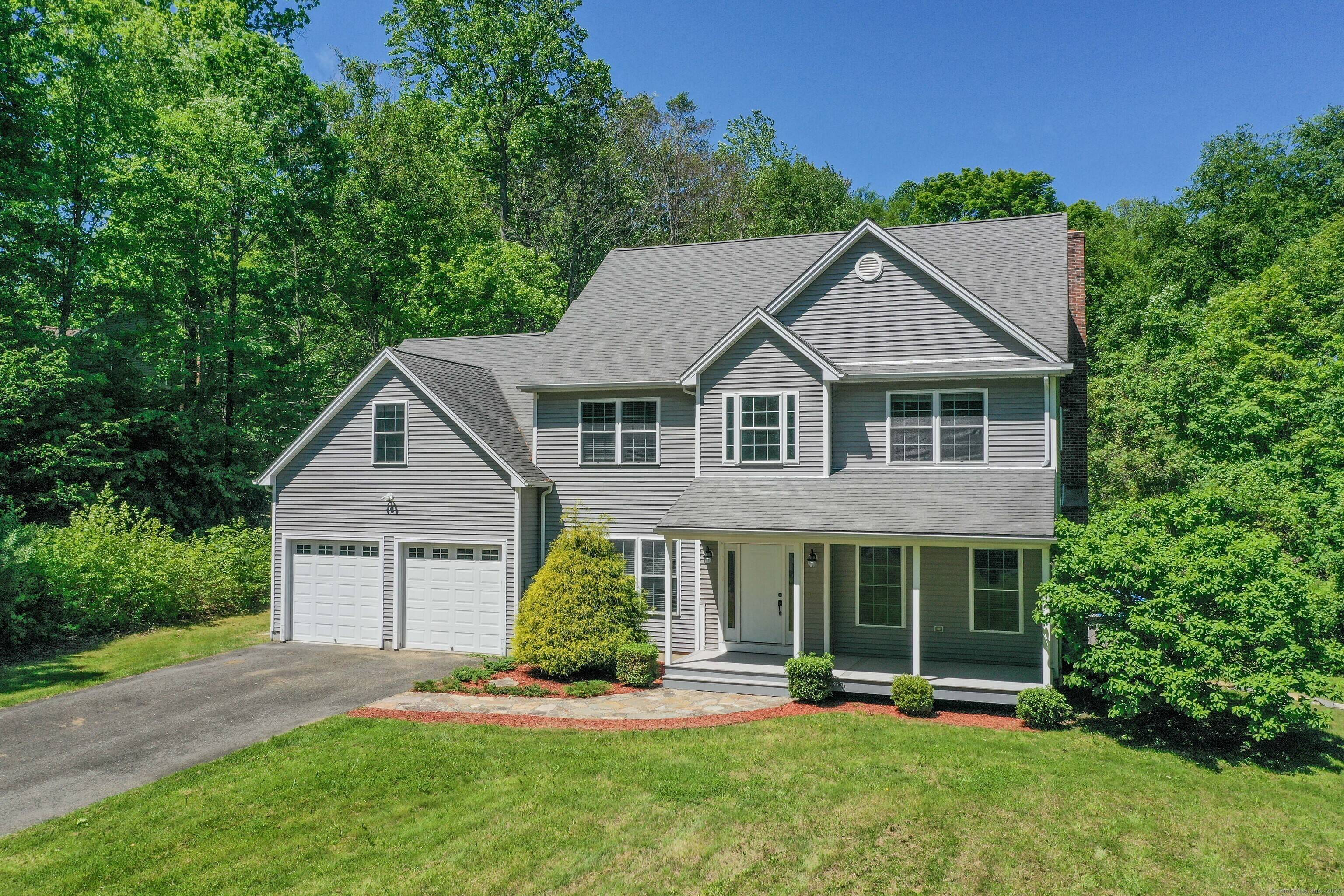 Welcome to this beautifully updated 2, 700 square foot Colonial that perfectly blends classic charm with modern finishes.