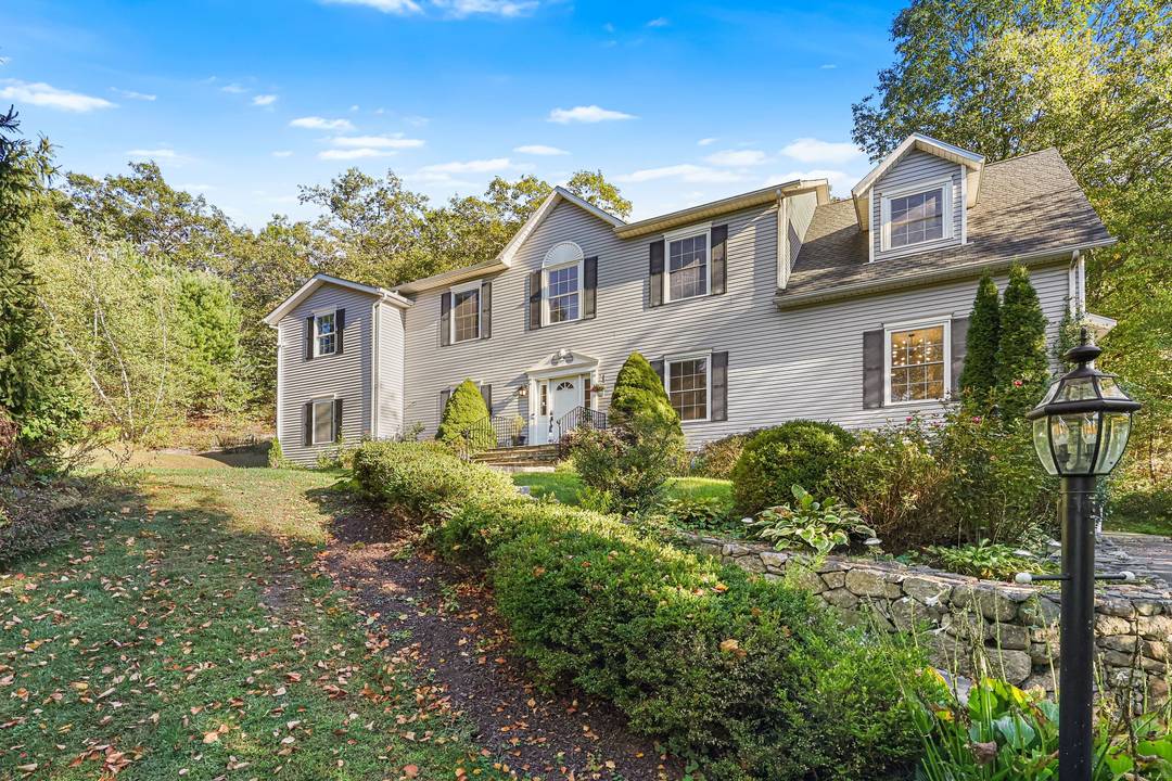 Welcome to this extraordinary colonial home on 2 Abbey Lane in Newtown, CT !