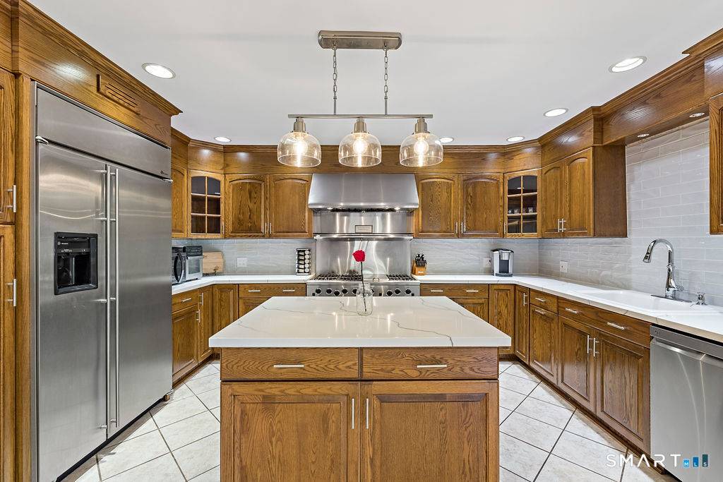 This massive, luxury, low maintenance home truly has it all.