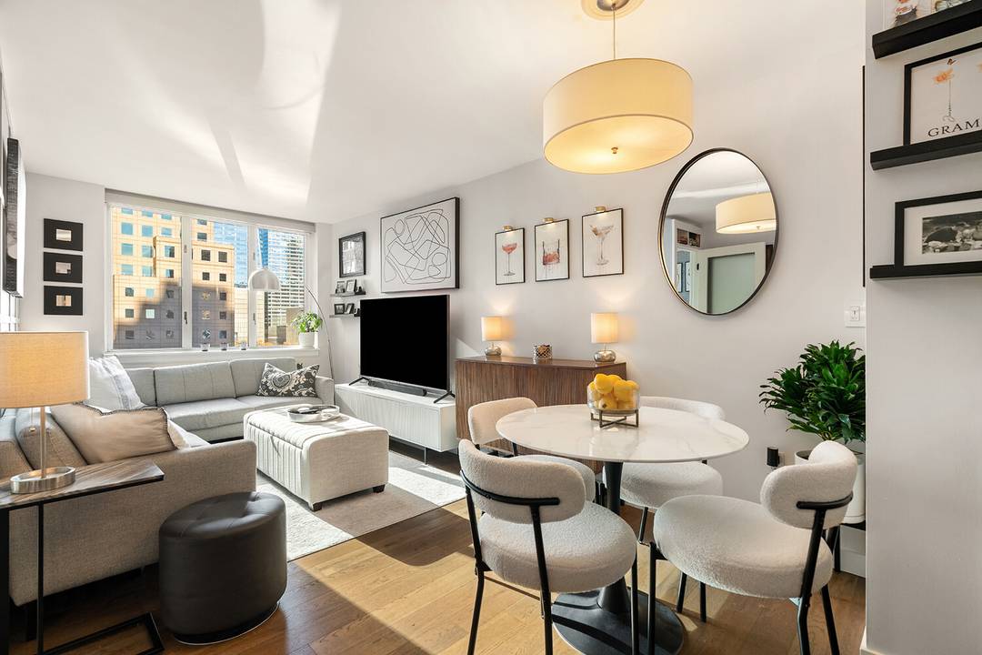 Designed with both comfort and creativity in mind, this beautifully reimagined alcove studio has been transformed into a functional one bedroom layout all while preserving the openness of the space.