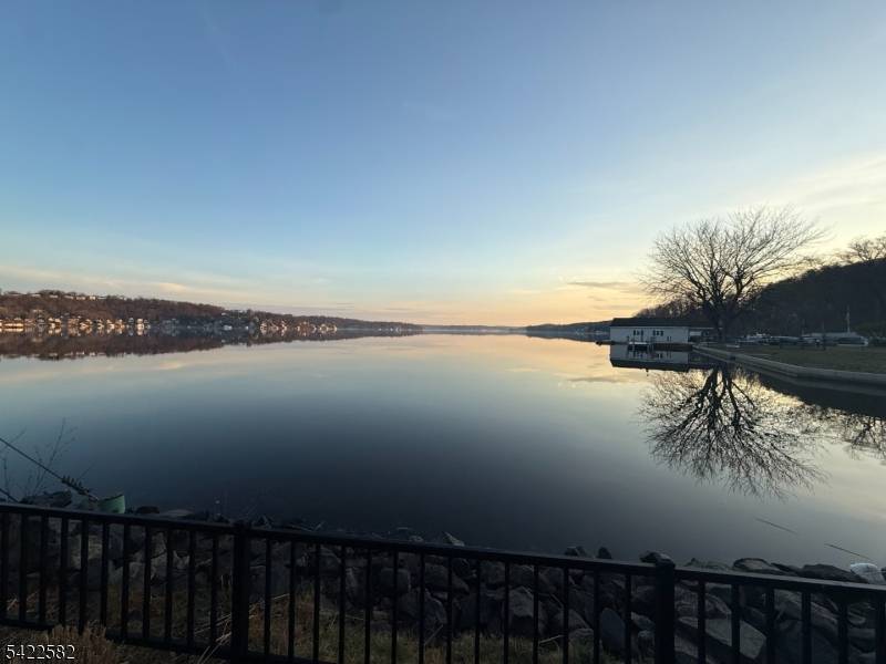 Come experience this three story luxury townhome on beautiful Lake Hopatcong !