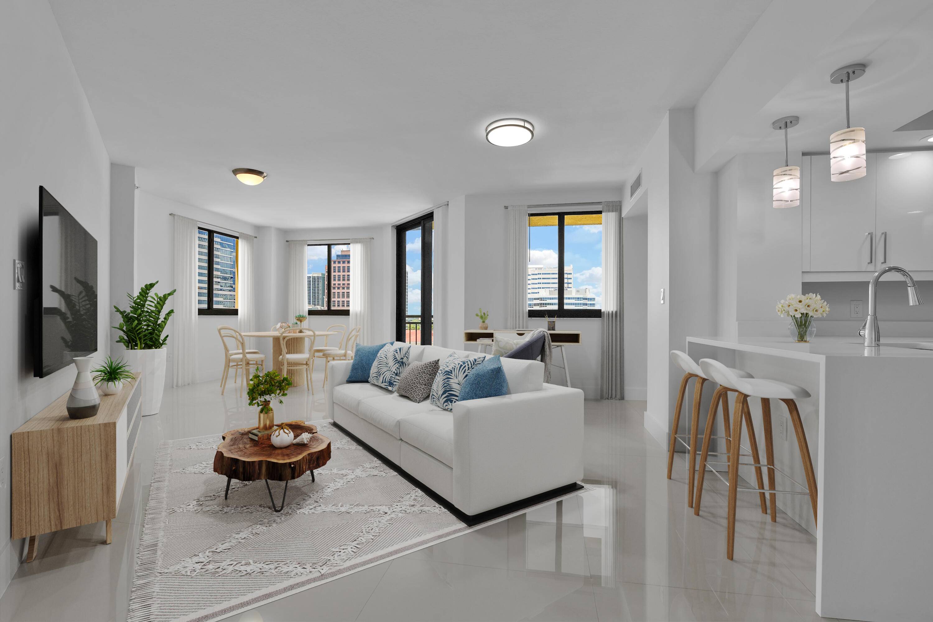 Bright corner unit with expansive, unobstructed city views and stunning sunsets.
