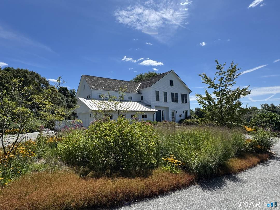 Step into luxury in this immaculate home on Washington's most prestigious streets overlooking farmland and large protected fields.