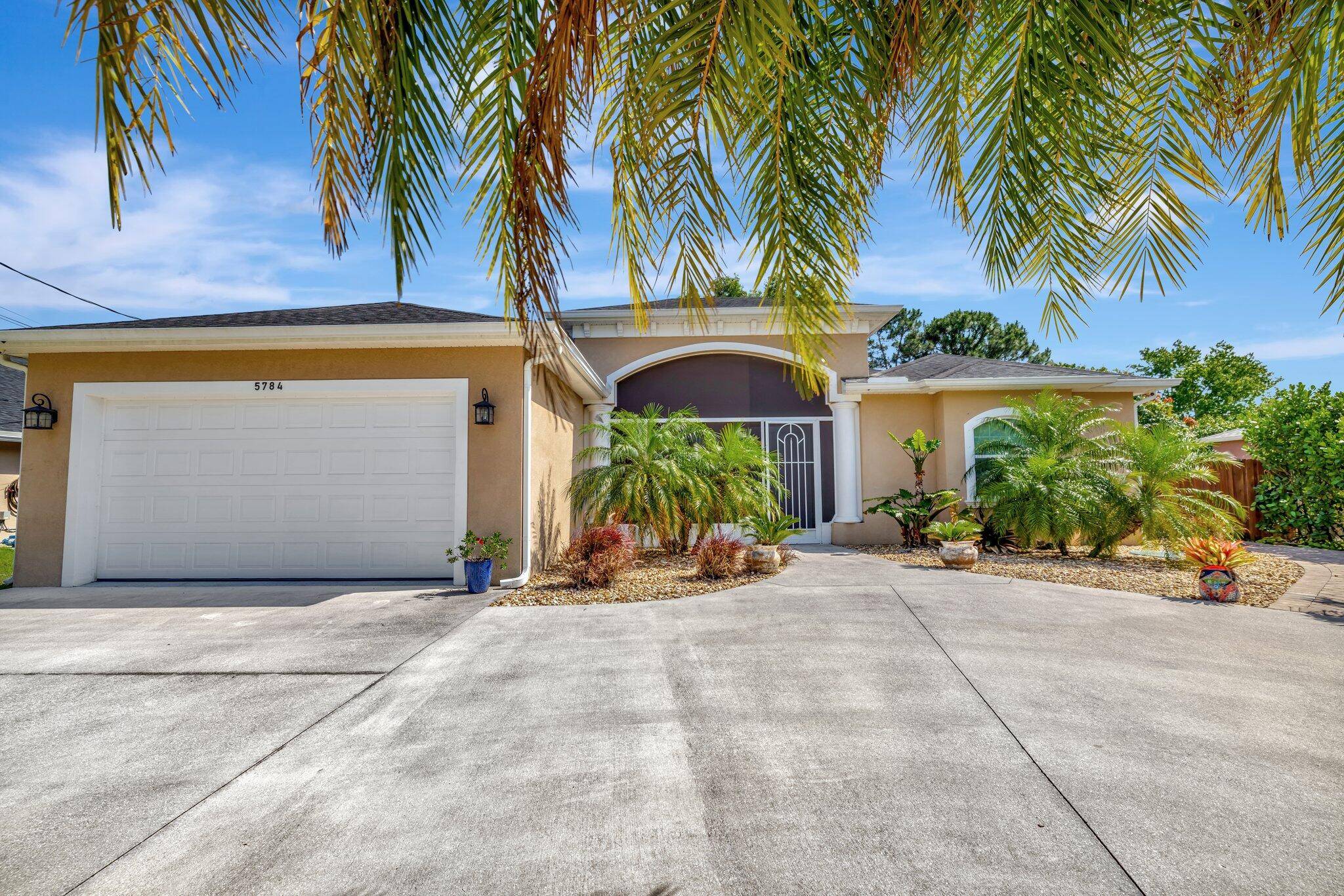 Absolutely Gorgeous Custom Built 4 Bedroom, 3 Bathroom Pool Home Located on a Quiet Street in the Desirable Torino Area with No HOA.