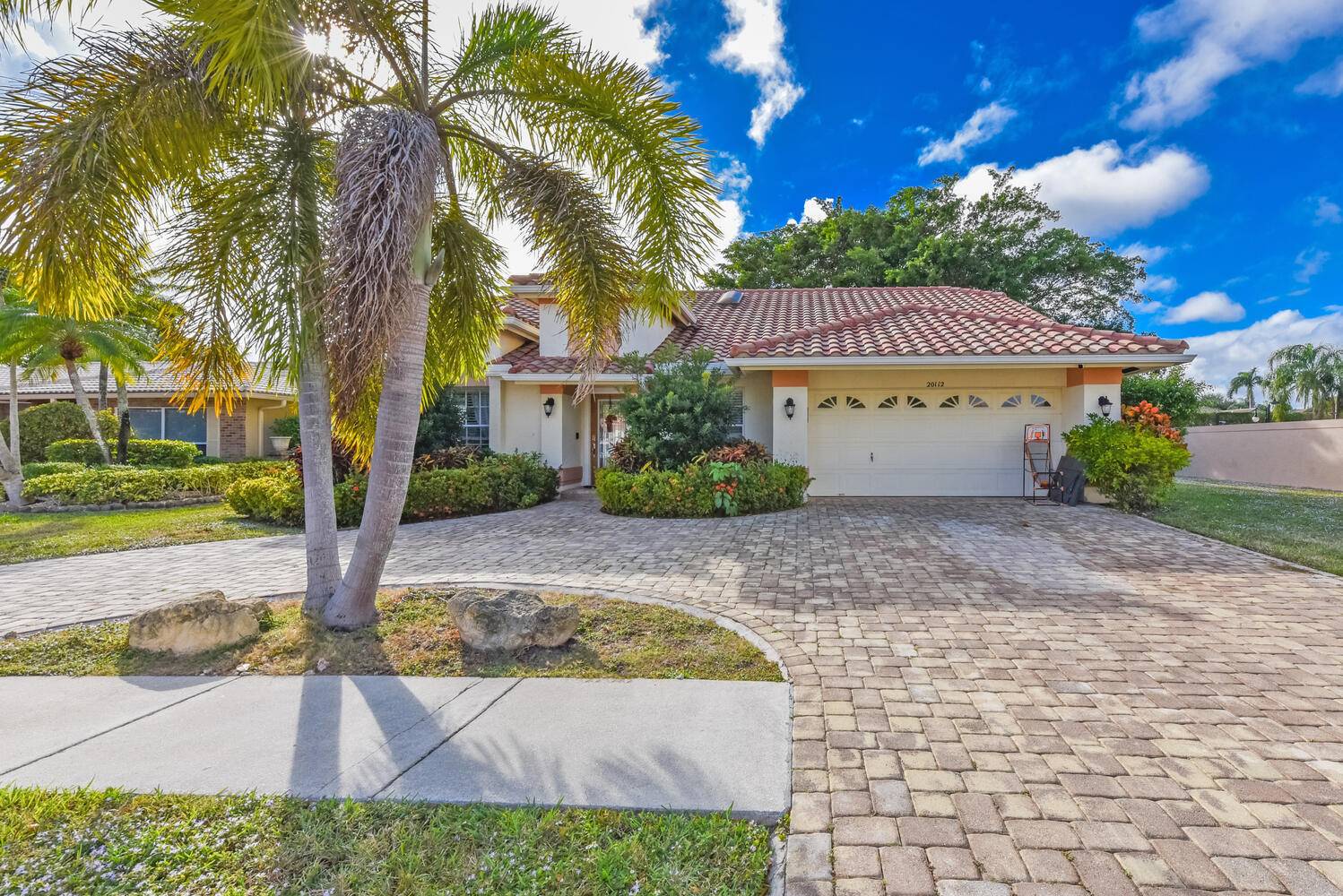 Charming Corner Lot Oasis with Luxurious Amenities !