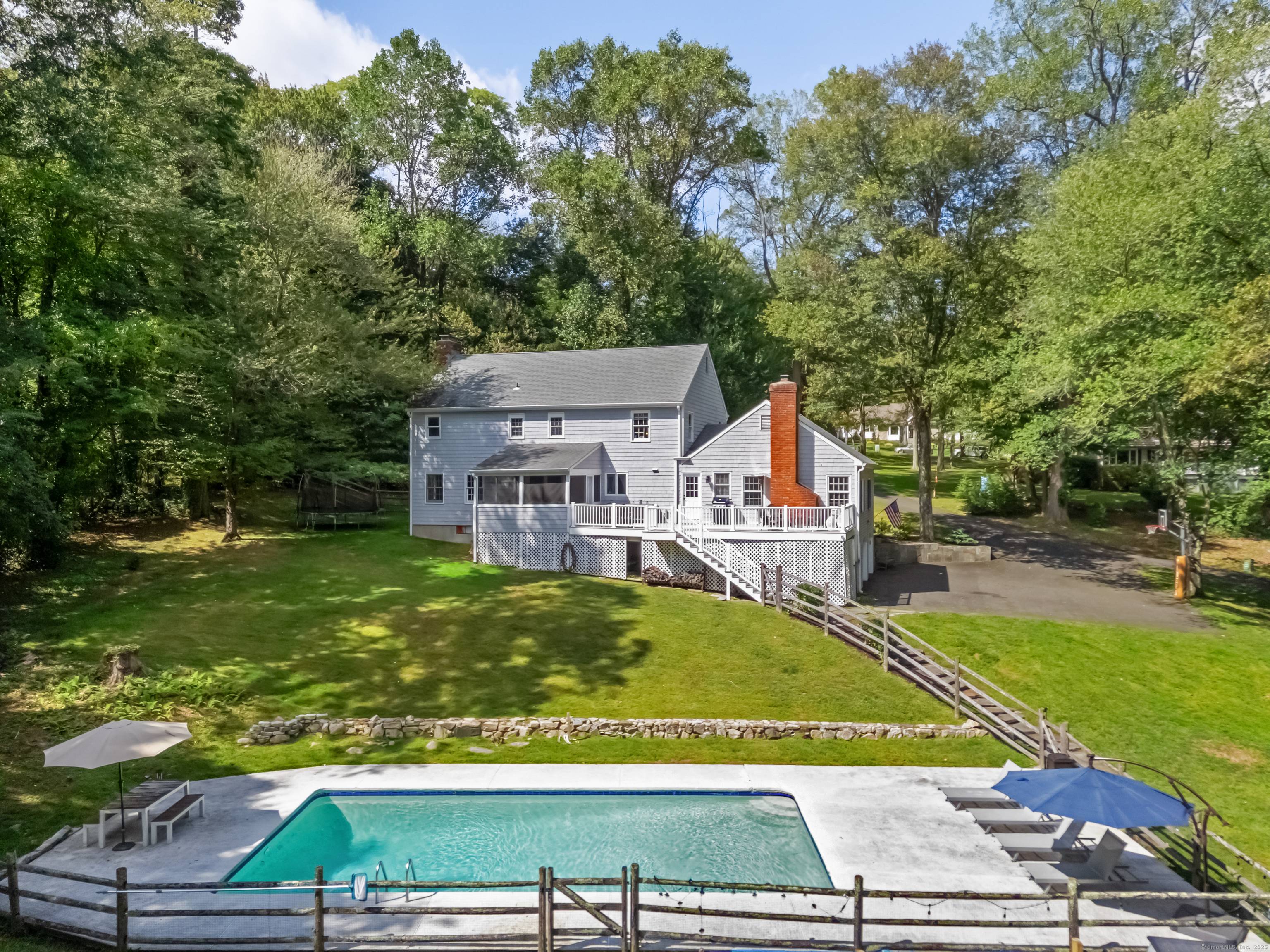 Welcome to 21 East Hill Road, a timeless New England Colonial tucked away on a quiet North Stamford cul de sac.
