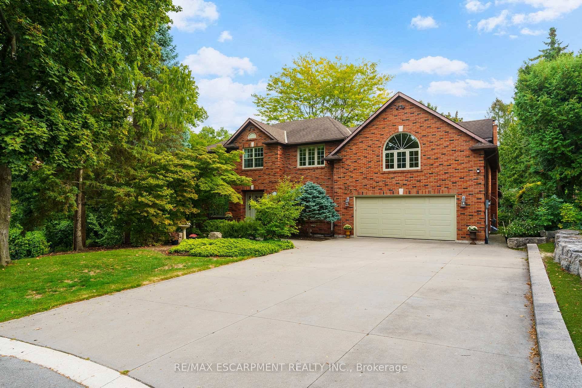 Dreams do come true ! Tucked into a picturesque, tree lined 0.