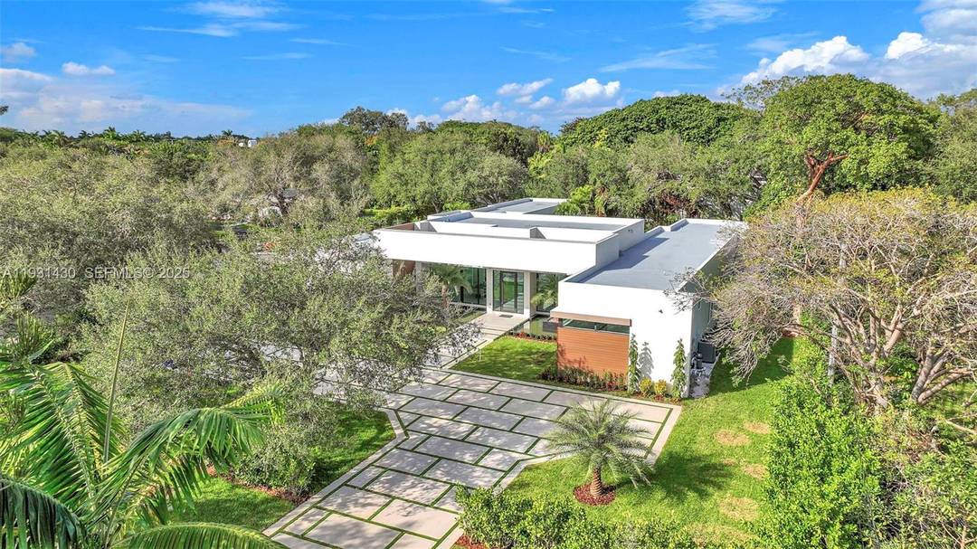 Completed in December 2025, this modern luxury residence sits on an expansive 34, 000 SF corner lot, offering exceptional privacy and a quiet setting.