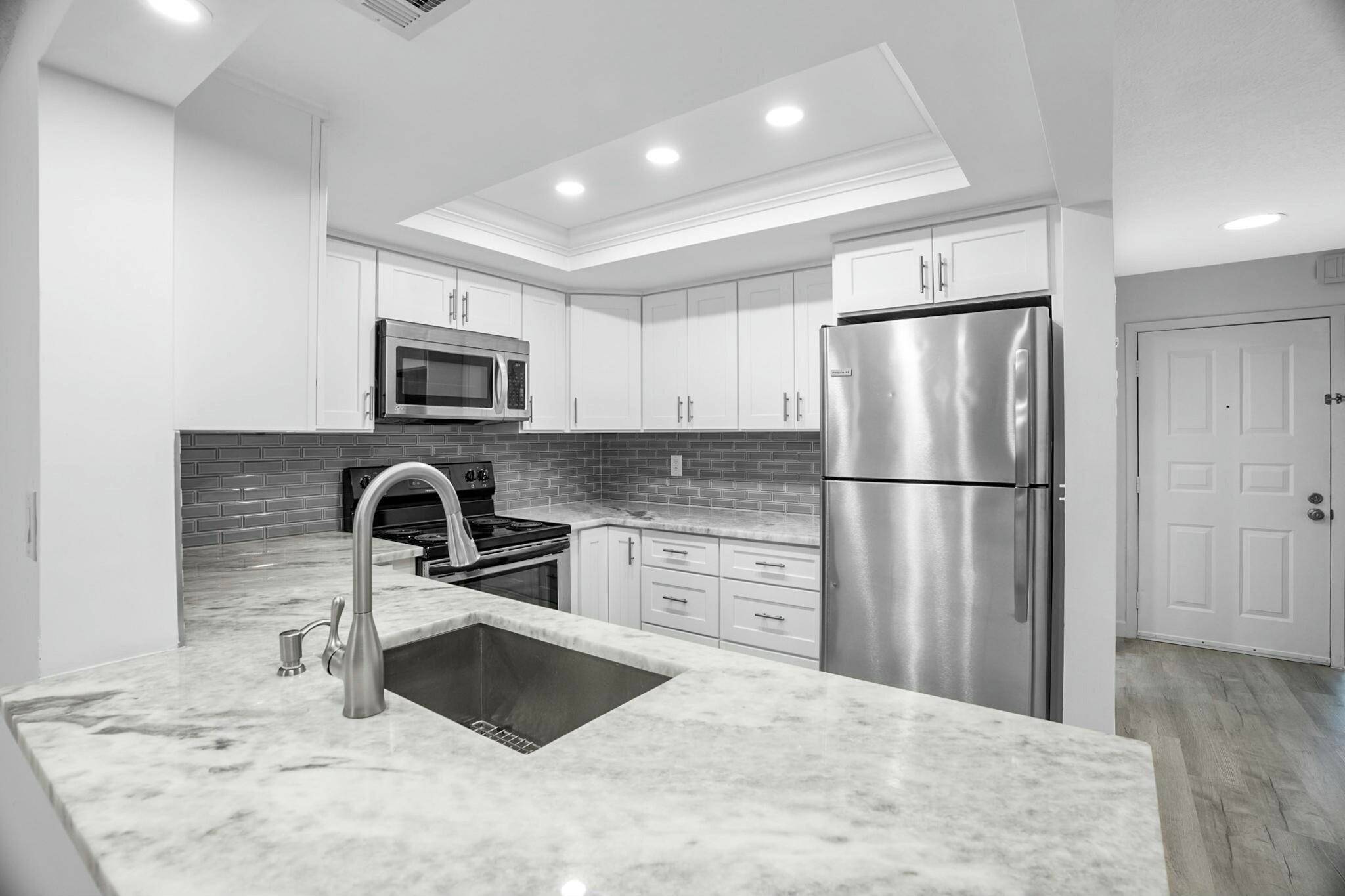 Beautifully remodeled 2 2 townhouse in the sought after Deer Creek neighborhood !