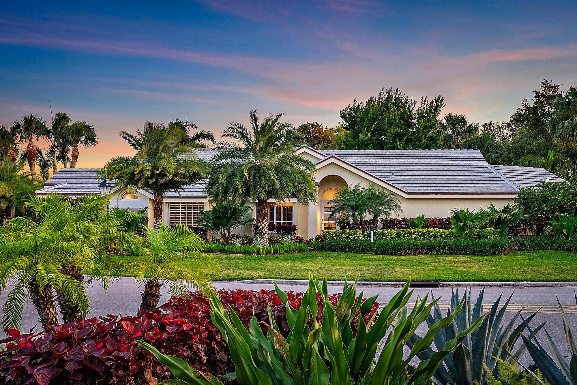 Nestled on a tranquil, private corner lot within the prestigious gated community of Jonathan's Landing, this beautifully updated 3 bedroom, 2.