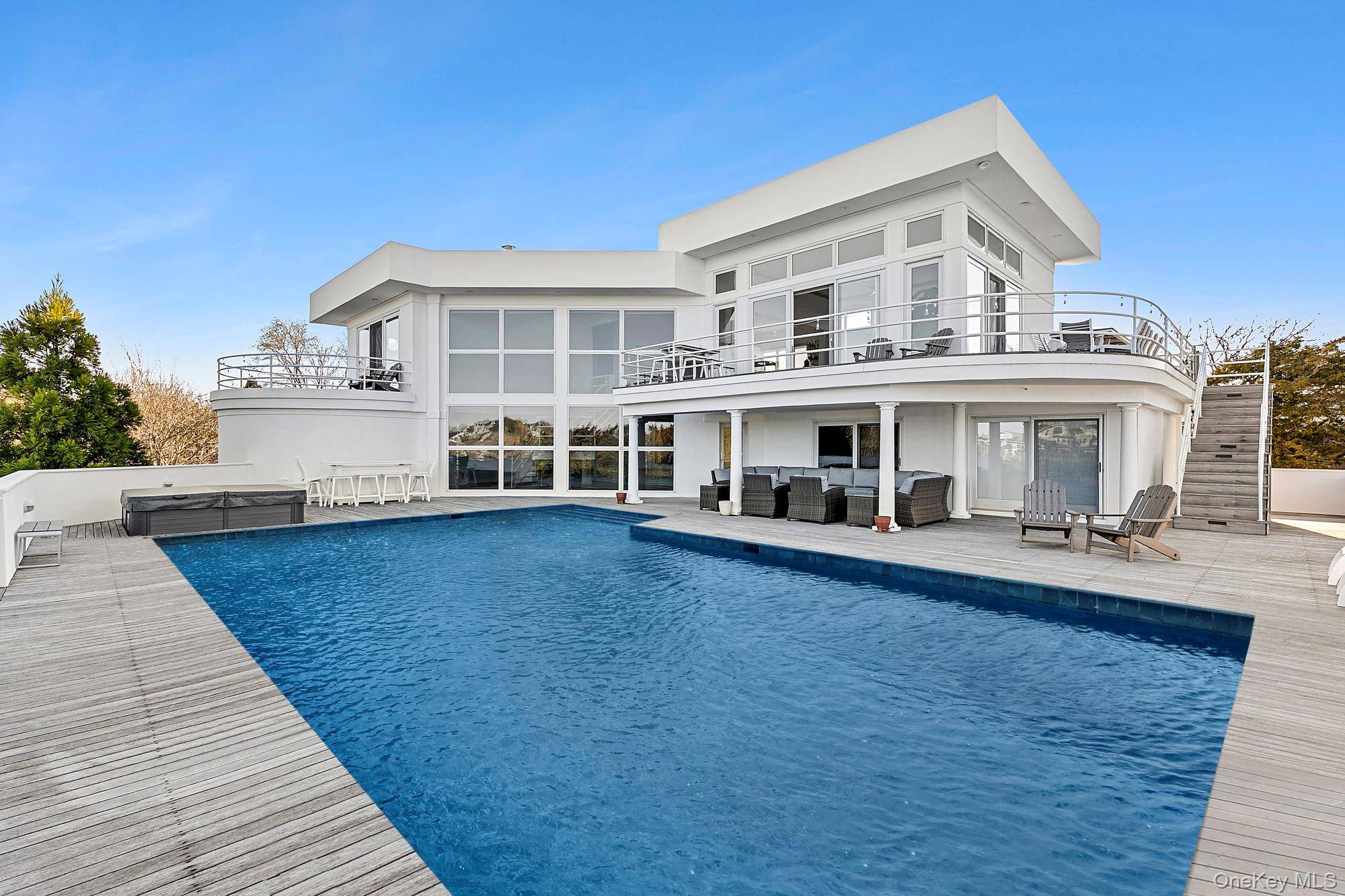 Introducing a one of a kind, newly renovated bayfront contemporary offered for the first time for a two week rental in June.