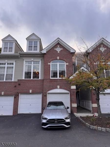 This beautifully updated, light filled townhome features 2 bedrooms, 2.