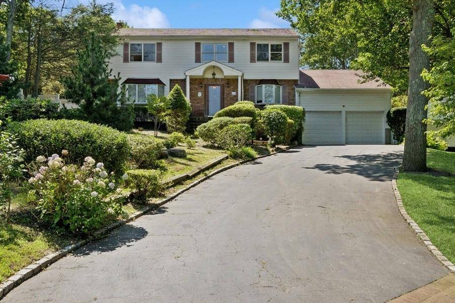 Set On A Quiet, Tree Lined Street, This Charming 4 Bedroom, 4 Bath Colonial Offers The Perfect Blend Of Warmth, And Space.