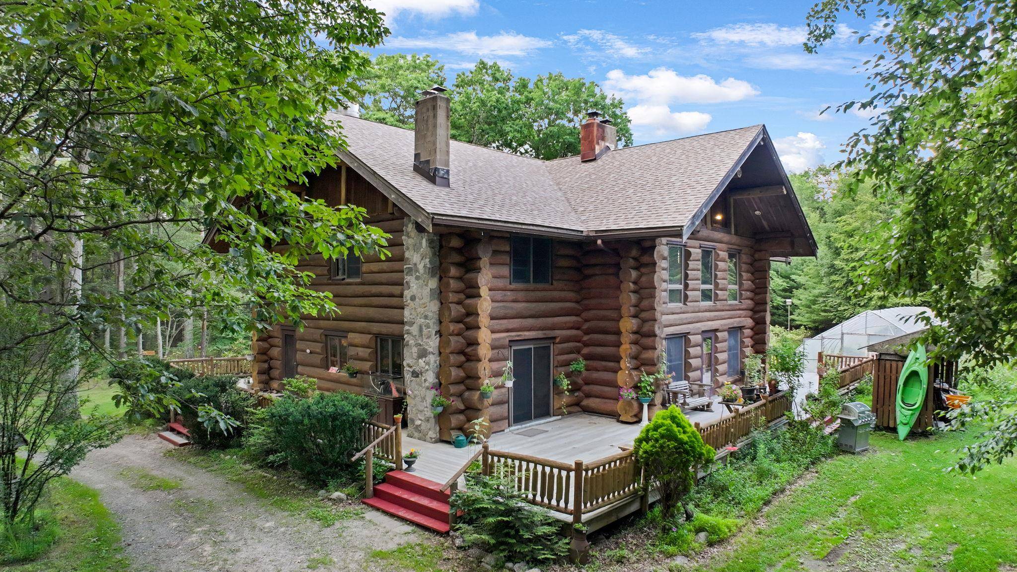 Escape into the peaceful mountainside with over 35 acres and no visible neighbors !