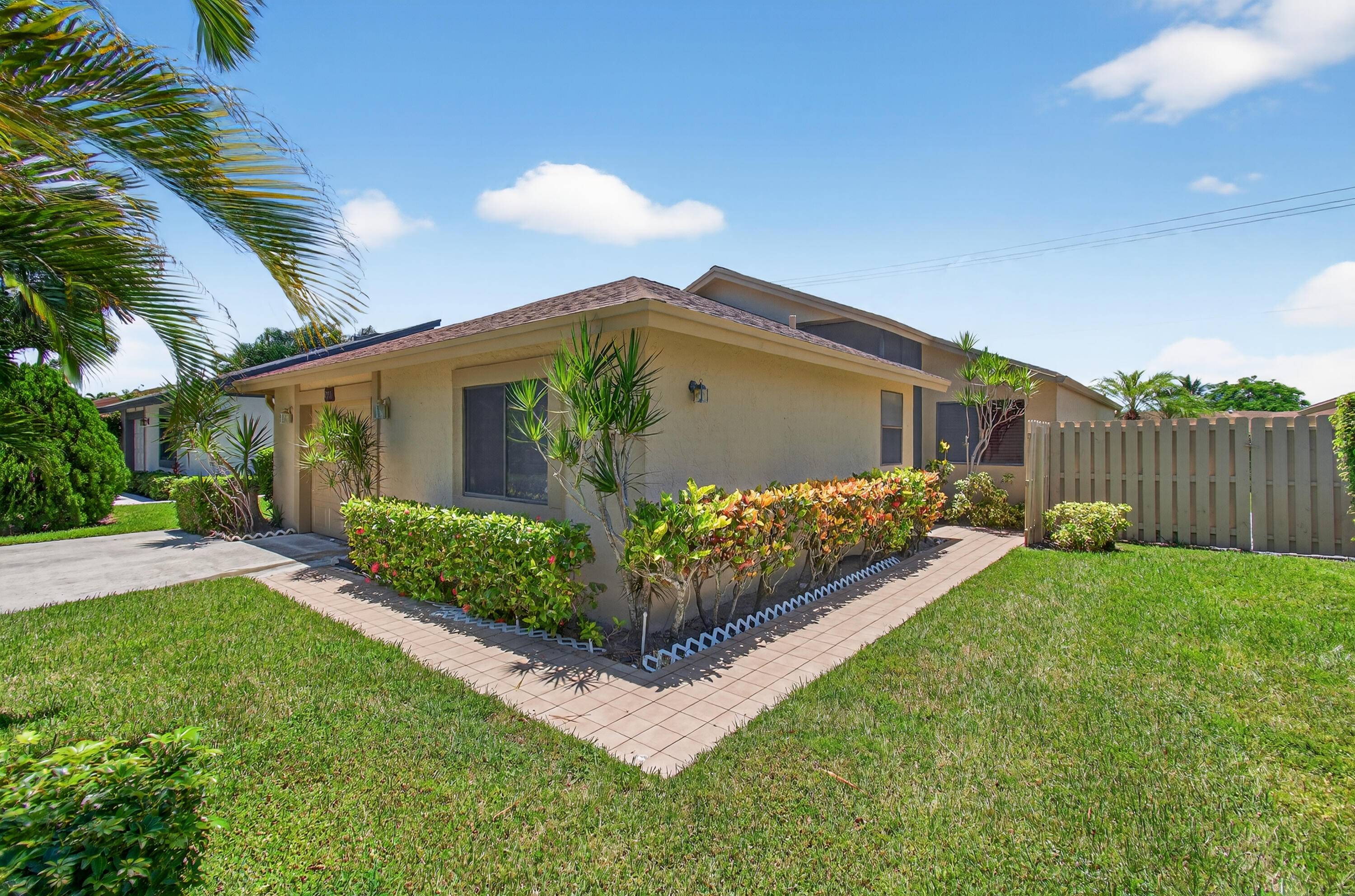 Beautiful 2 bedroom, 2 bathroom, single family home in a gated 55 community with resort style amenities.