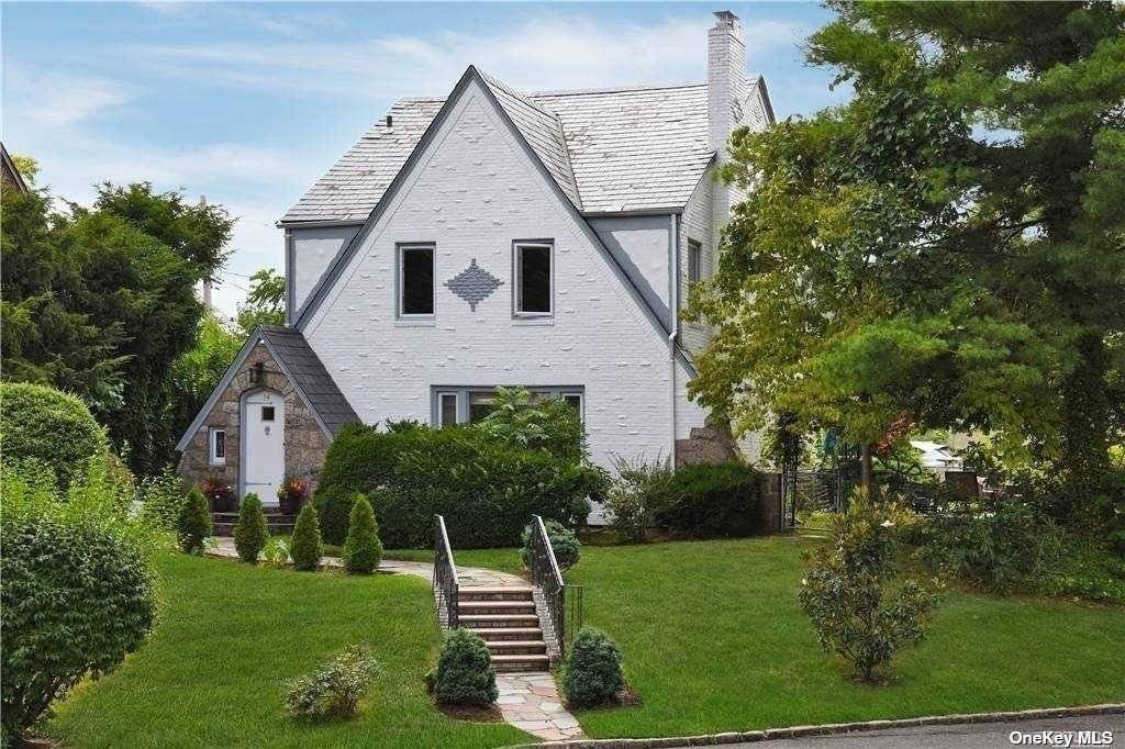 Bright and Renovated All Brick Tudor in a Fabulous Location.