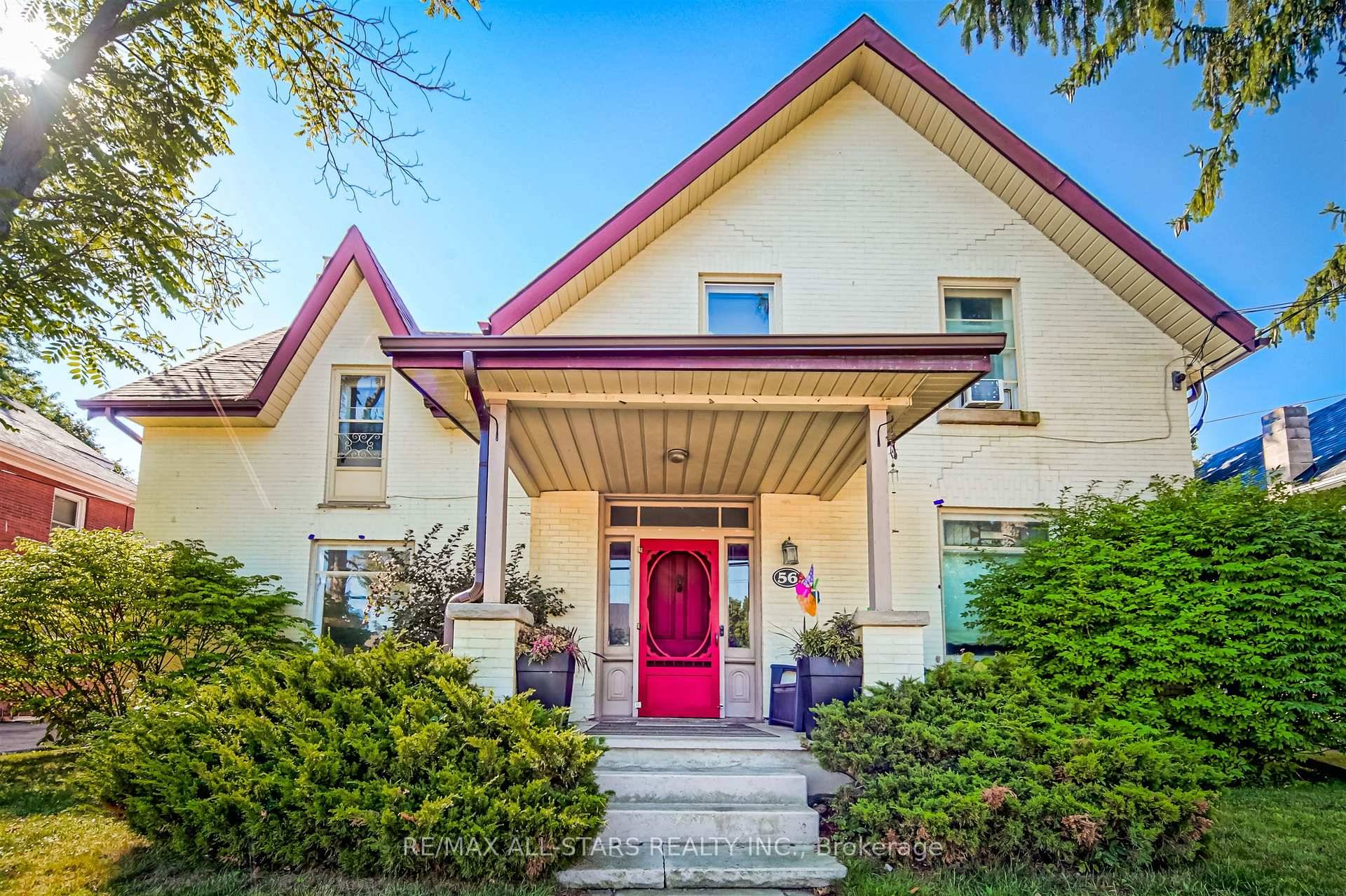 Nestled on a spacious and private 66 x 165 lot, this all brick two storey legal duplex with an additional 600 sq.