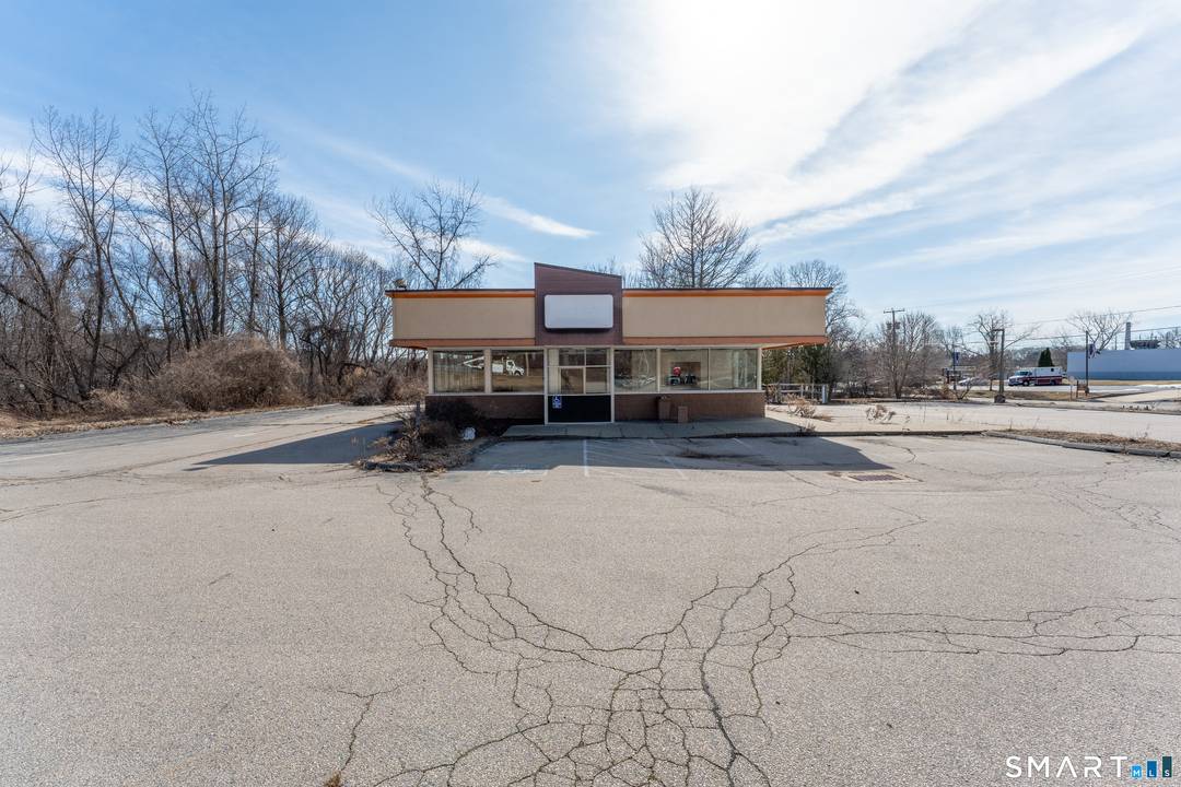 Positioned along highly traveled Route 32, this former Dunkin' Donuts property presents a prime commercial redevelopment or owner user opportunity in a high visibility location.