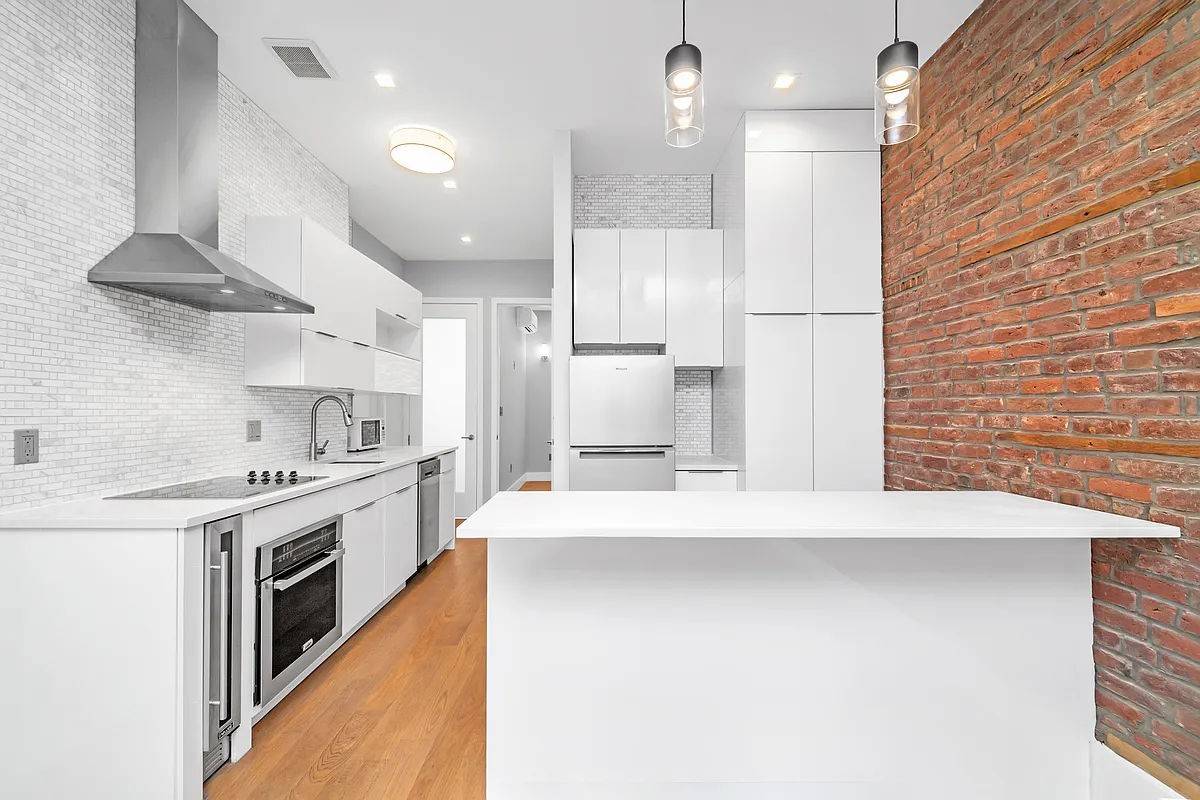 Brand New Gut Renovated Townhouse in the Heart of NomadThe Unit 4 Queen Size Bedrooms Room for Desks and Additional Furniture in All Bedrooms Exposed Brick Bosch Washer Dryer In ...